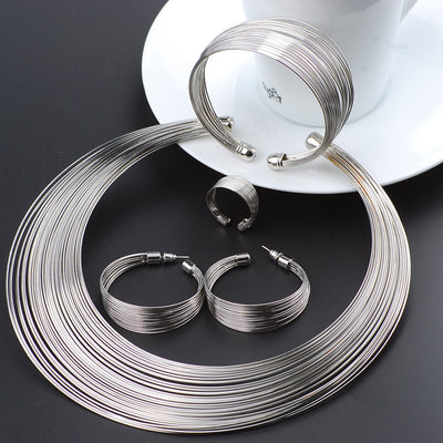 Juego de Aretes de Rayas Metálicas - Image 6