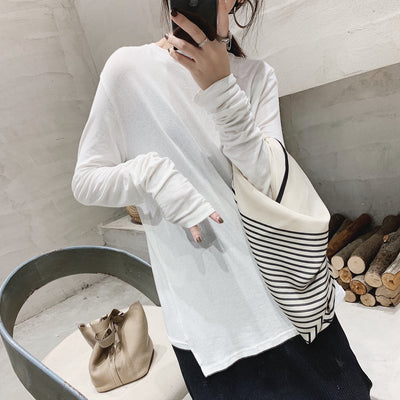 Blusa de Manga Larga con Corte Asimétrico