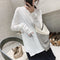 Blusa de Manga Larga con Corte Asimétrico