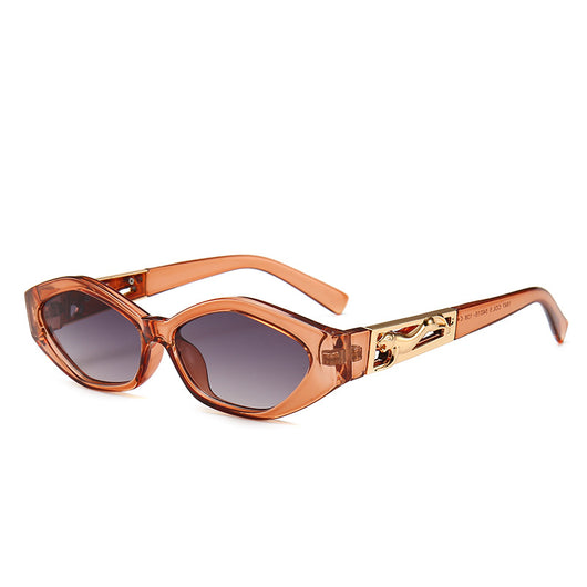 Angular cat-eye sunglasses with a tortoiseshell frame, brown gradient lenses, and gold jumping cheetah temple details. - Image 7