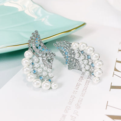 Aretes de Perla Elegantes con Zirconia y Diseño Ondulado - Image 6