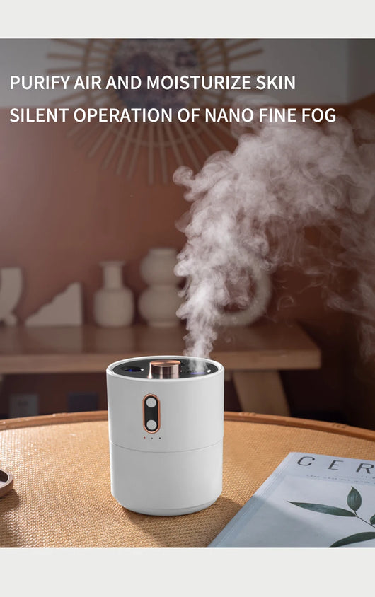 White cylindrical desktop humidifier with rose gold accents, black top, and front control buttons. - Image 16