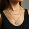 Collar Multicapa con Perla de Agua Dulce y Dije de Carácter