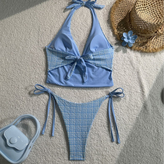 Light blue textured plaid two-piece swimsuit with a halter top and side-tie bikini bottoms, featuring small white bows. - Image 2