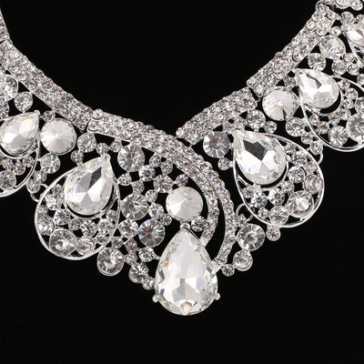 Silver-tone necklace and matching drop earrings set with clear rhinestones and teardrop crystals, ideal for weddings. - Image 6