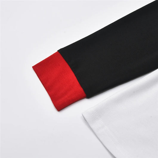 White long-sleeve pajama top with "wild one" graphic and red and black plaid pants. - Image 22