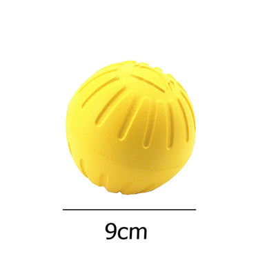Bright yellow EVA pet ball dog toy with textured grooves and paw print details for interactive play. - Image 5
