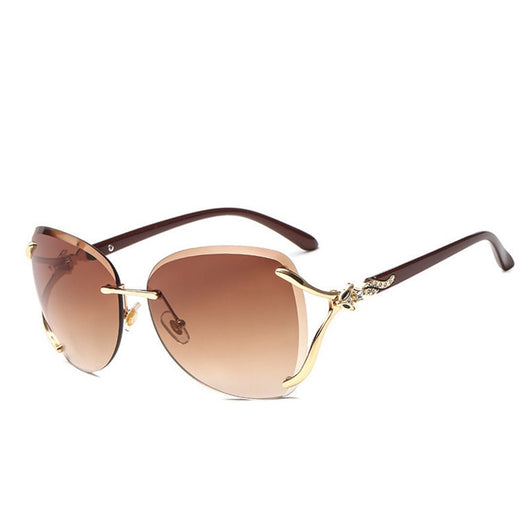 Oversized rimless sunglasses with gradient gray lenses and silver-tone metal accents, displayed on a white surface. - Image 2