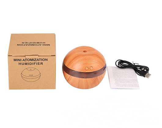 Mini essential oil diffuser humidifier with wood grain finish, USB cable, and instruction manual on a white background. - Image 9
