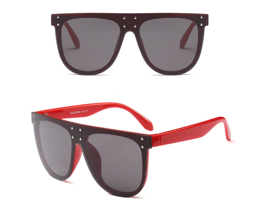 Black and white flat top sunglasses with dark lenses and small gold-toned stud details on the frame. - Image 6