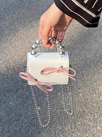 Bolso de Mano Mini con Cadena y Moño Texturizado - Image 6