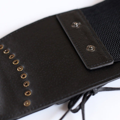 Red wide elastic belt with a faux leather lace-up front panel and bronze-tone eyelets, tied at the bottom. - Image 4