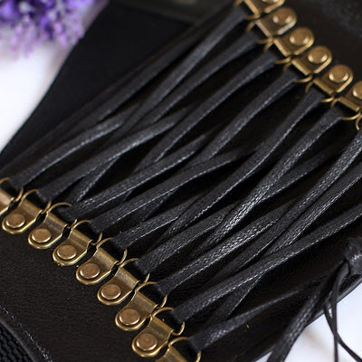 Red wide elastic belt with a faux leather lace-up front panel and bronze-tone eyelets, tied at the bottom. - Image 5