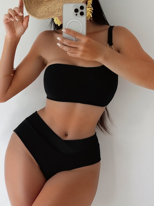 Black one-shoulder bikini with a gold-tone metal buckle detail and high-waisted bottoms with a V-front design. - Image 10