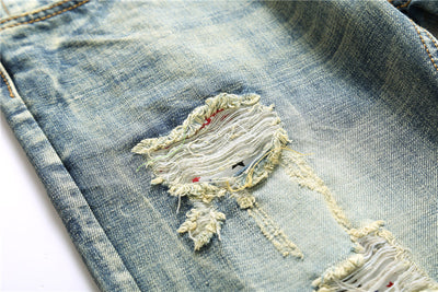 Jeans Rotos Vintage para Hombre con Diseño Desgastado y Bajo Acampanado - Image 2