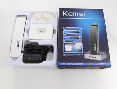 White and silver Kemei Professional Trimmer electric hair clipper with charging base. - Image 3
