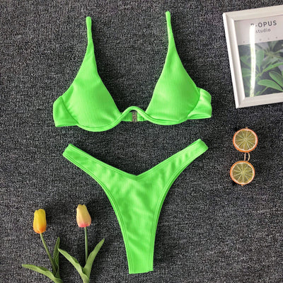 Neon green ribbed two-piece swimsuit with an underwire bikini top and high-cut bottoms on a dark grey background. - Image 18