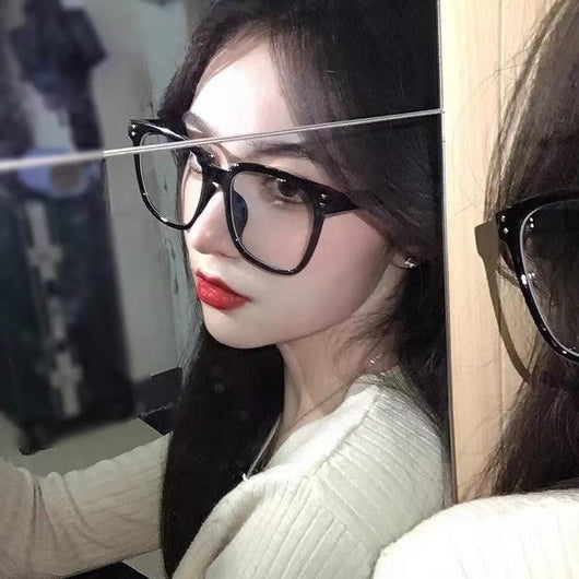 Full-frame trendy blue light blocking glasses with a transparent blue square frame and clear lenses. - Image 17
