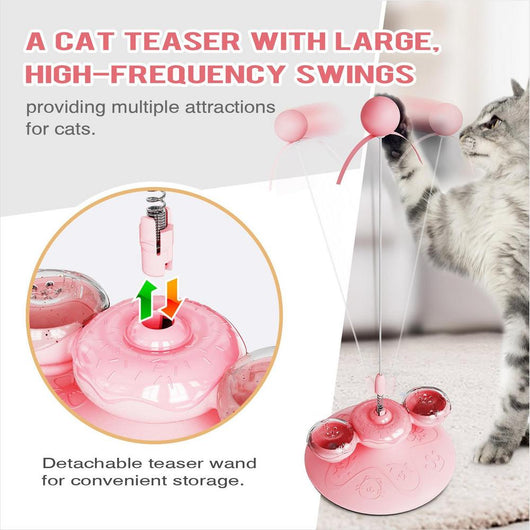 Tabby cat playing with a yellow suction cup cat toy featuring a spring-mounted teaser wand with an orange fur ball. - Image 11