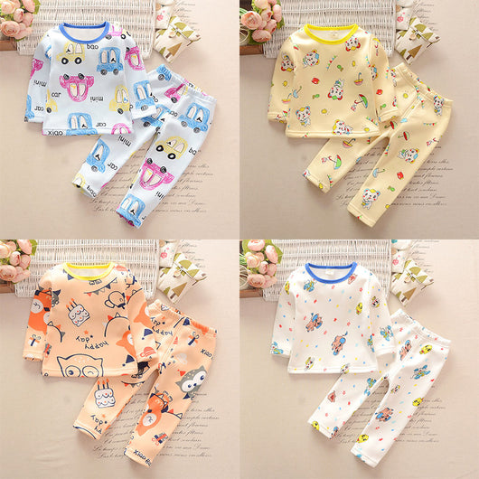 Toddler unisex long-sleeve underwear set with colorful car print in blue, yellow, and pink on a white background.