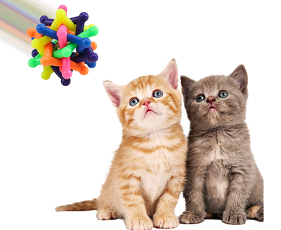 Colorful rainbow pet chew toy ball made of soft rubber with an interlocking design and an internal bell. - Image 12