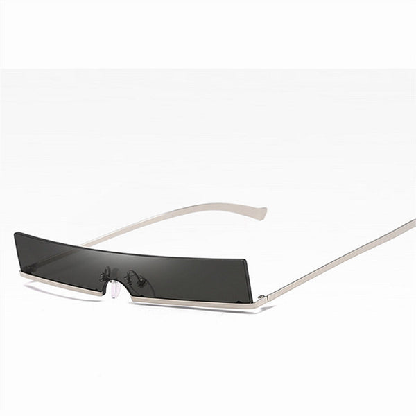Frameless rectangular sunglasses with dark lenses and silver-colored metal temples, featuring an avant-garde style. - Image 8