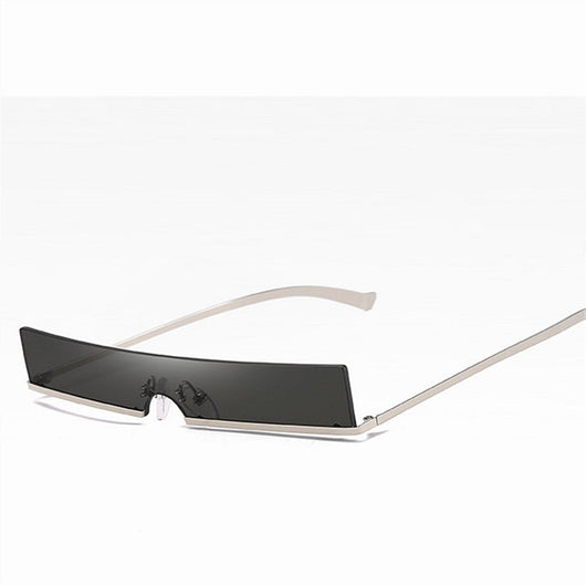 Frameless rectangular sunglasses with dark lenses and silver-colored metal temples, featuring an avant-garde style. - Image 8