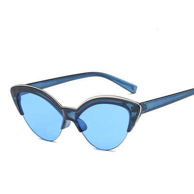 Purple cat-eye sunglasses with translucent frames and purple lenses, featuring a silver-tone accent. - Image 14
