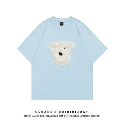 Black short sleeve t-shirt with a fluffy white puppy face embroidery, featuring a small gold barrette on its ear. - Image 9