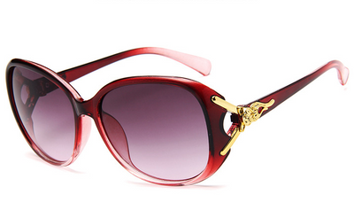 Brown oversized women's sunglasses with gradient lenses and gold-tone fox head embellishments on the temples. - Image 5