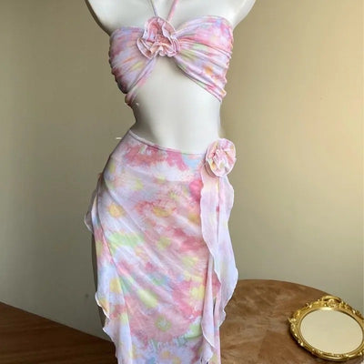 Women's floral split skirt-style swimsuit bikini three-piece suit with halter top and sheer wrap skirt. - Image 4