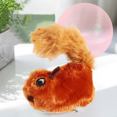 Beige plush simulated hamster cat toy with pink ears and a small tail, next to a translucent pink rolling ball. - Image 17