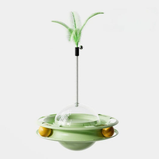 Yellow UFO tumbler cat toy with rolling balls, a clear dome, and a spring-mounted feather wand with a bell. - Image 3