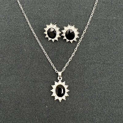 Iridescent teardrop pendant necklace with matching stud earrings, featuring clear accent stones and silver-tone metal. - Image 6
