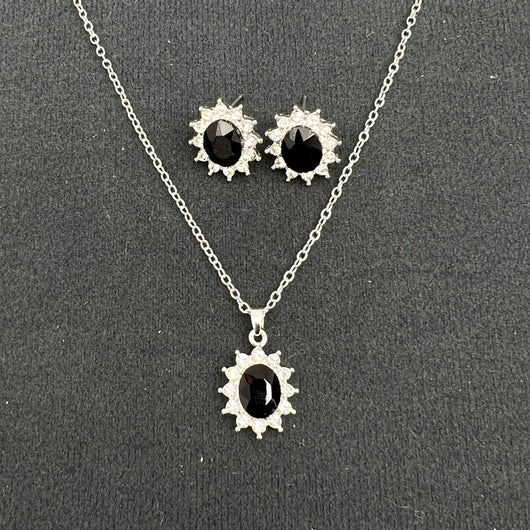Iridescent teardrop pendant necklace with matching stud earrings, featuring clear accent stones and silver-tone metal. - Image 6