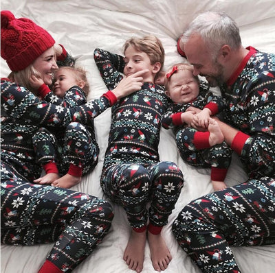 Dad's black long-sleeve pajama set with festive gnome and snowflake fair isle pattern, red trim. - Image 13
