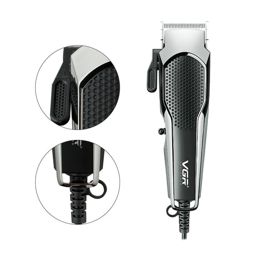 VGR V-130 professional hair clipper set with silver and black clipper, four guide combs, scissors, comb, and oil. - Image 11