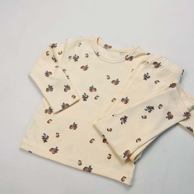 Light yellow infant long-sleeved pajama set with milk bottle and cookie print, suitable for homewear. - Image 24