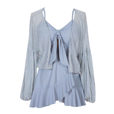 Women's light blue one-piece swimsuit with tie-front bust and ruffled hem, paired with a sheer shimmery cover-up. - Image 5