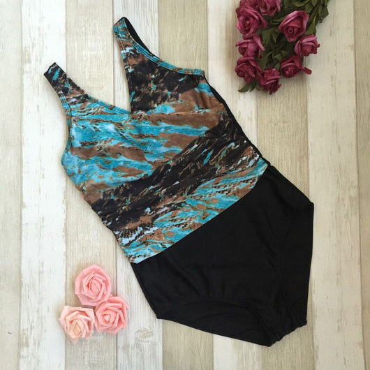 Women's one-piece swimsuit with a black bottom and a blue, brown, and white abstract patterned, ruched V-neck top. - Image 2