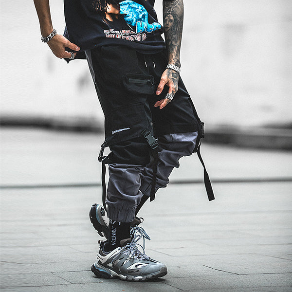 Pantalones deportivos con múltiples bolsillos y cordón ajustable