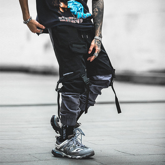 Pantalones deportivos con múltiples bolsillos y cordón ajustable