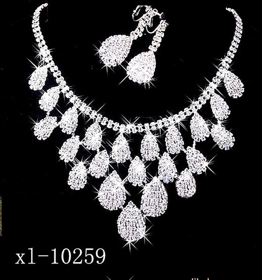 Sparkling silver-tone necklace with multiple teardrop-shaped rhinestone pendants, ideal for wedding or evening wear.