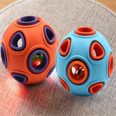 Blue and orange rubber pet toy ball with multiple circular cutouts, designed for interactive play and chewing. - Image 3