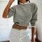 Blusa Gris de Encaje Floral con Cuello Redondo y Mangas Largas