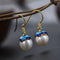 Aretes de Plata 925 con Perla de Agua Dulce Diseño Loto Tailandés