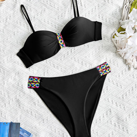 Black split bikini swimsuit for women with a bandeau top and high-cut bottom, featuring colorful geometric patterns. - Image 3