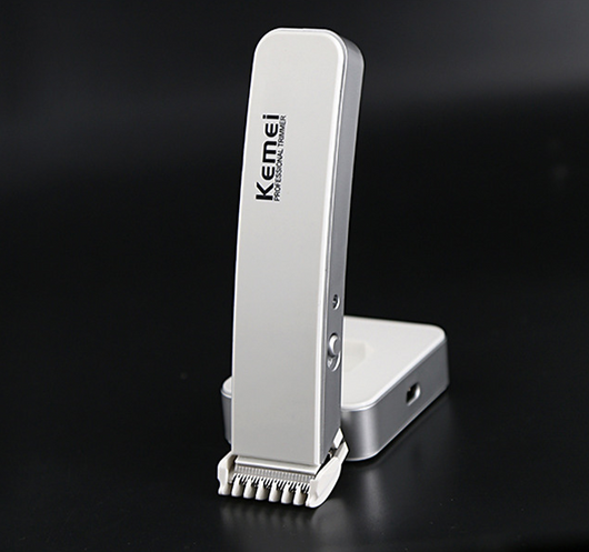 White and silver Kemei Professional Trimmer electric hair clipper with charging base. - Image 7