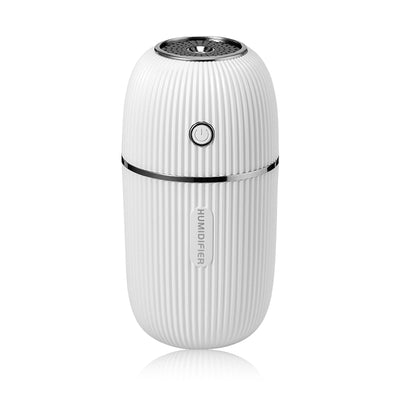 Navy blue portable humidifier with a ribbed texture, silver accents, and a power button on a white background.