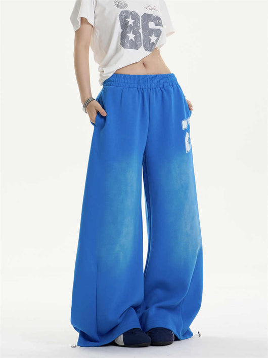 Pantalones Jogger Holgados con Letras Desgastadas y Cordón Ajustable - Image 6